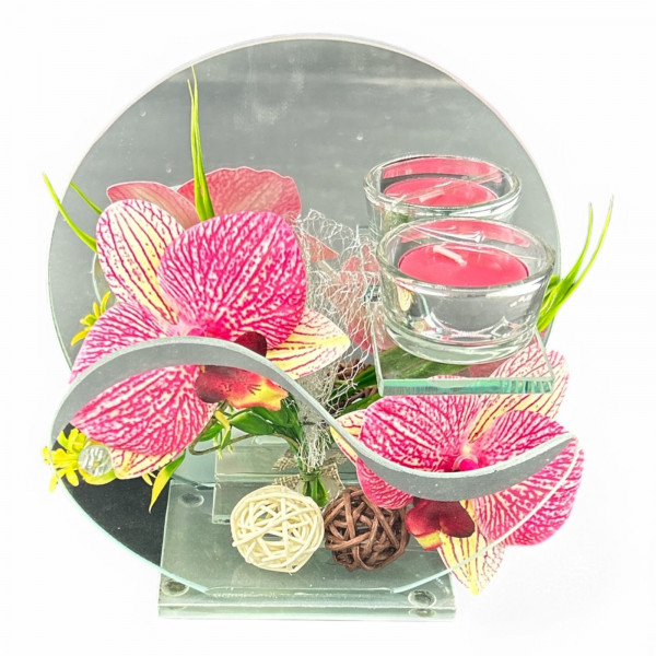 Glasdeko mit Blumen und Teelicht in Verpackung